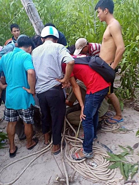 Nam thanh niên cố thủ dưới giếng hơn 3 giờ ảnh 1