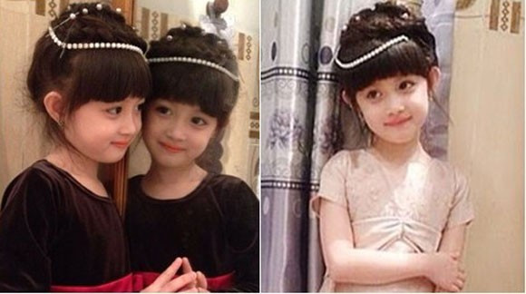 Thừa hưởng vẻ đẹp từ mẹ, cô bé lớp 1 mang cái tên mỹ miều Vũ Ngọc Thiên Băng thậm chí còn xinh xắn hơn với nước da trắng trẻo, khuôn mặt thanh tú, nụ cười đáng yêu và đặc biệt là đôi mắt to tròn. Bài viết: http://news.zing.vn/Co-be-hoc-lop-1-xinh-nhu-tieu-cong-chua-post359856.html#home_cate.tinmoi Nguồn Zing News 