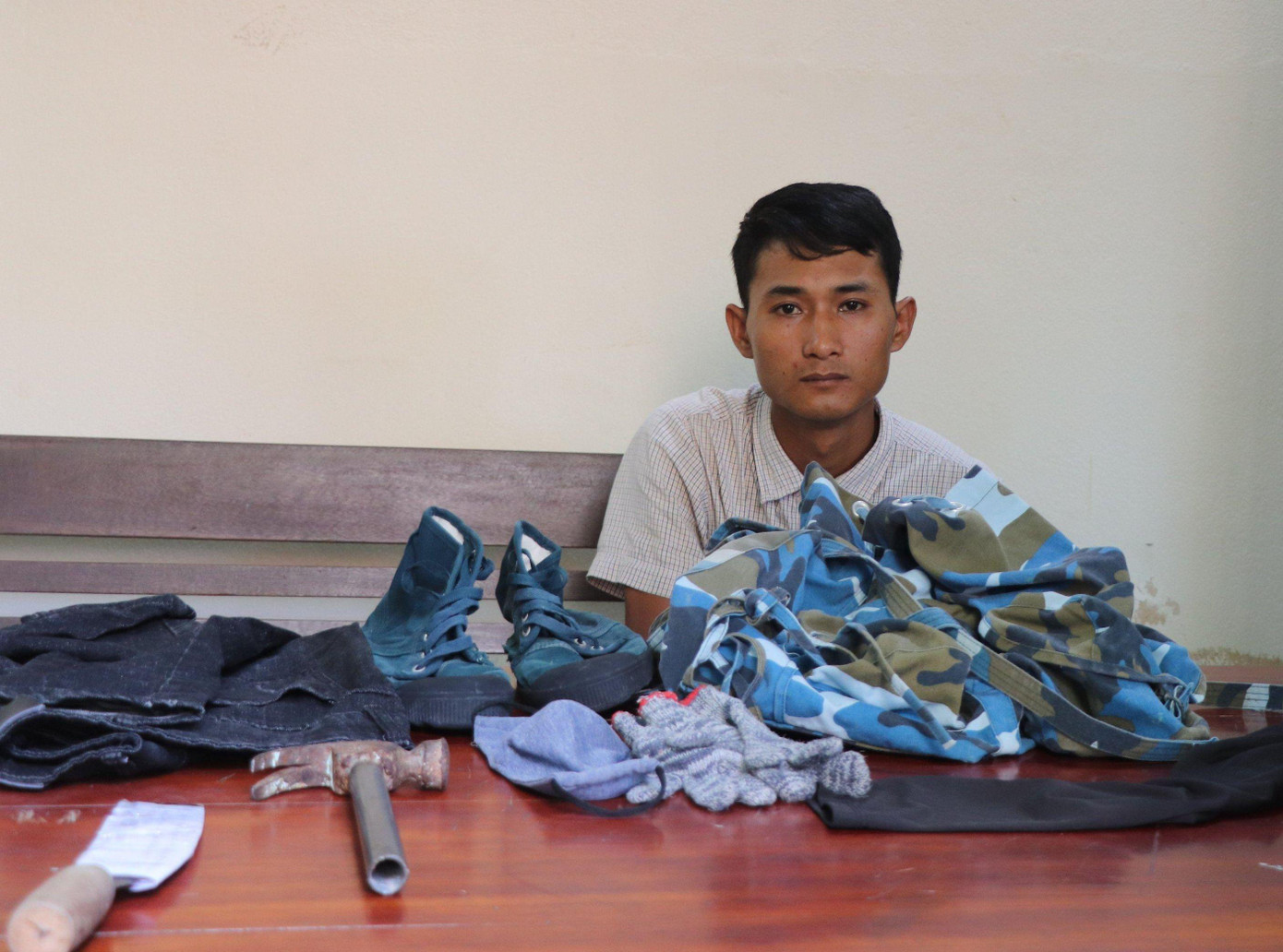 Trần Sơn Bá tại cơ quan công an.