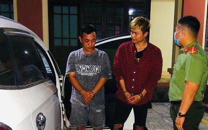 Phạm Quốc An và Đỗ Quốc Chinh. Ảnh CA