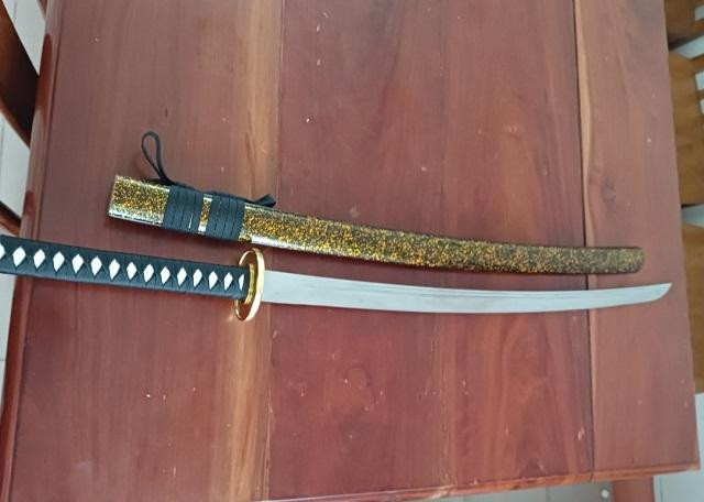 Vũ khí nóng mà nhóm đối tượng sử dụng để uy hiếp người vay. Ảnh CA