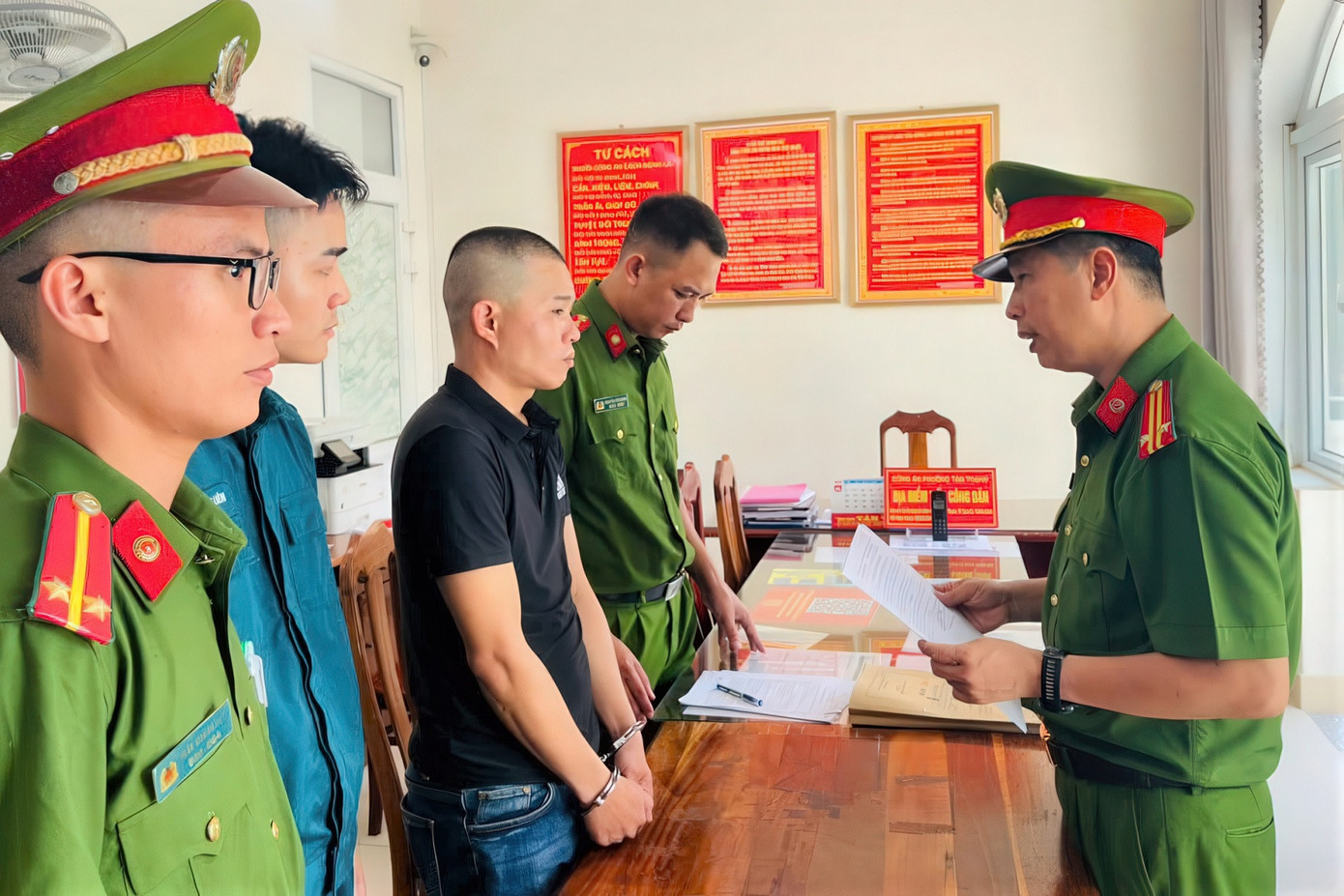 Nguyễn Quốc Đại tại cơ quan công an. Ảnh CA