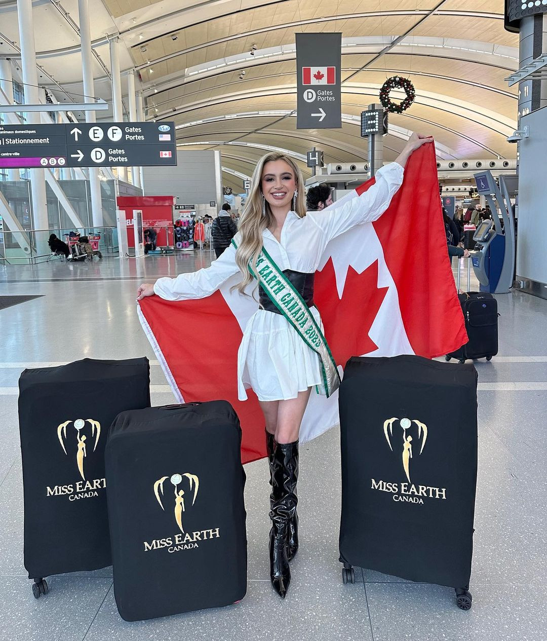 Người đẹp Canada - Layanna Robinson mặc váy trắng nền nã.