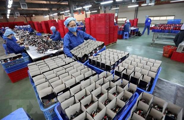 Đóng gói càphê xuất khẩu sang Singapore tại Công ty cổ phần càphê hòa tan Trung Nguyên Bắc Giang. (Ảnh: Danh Lam/TTXVN)