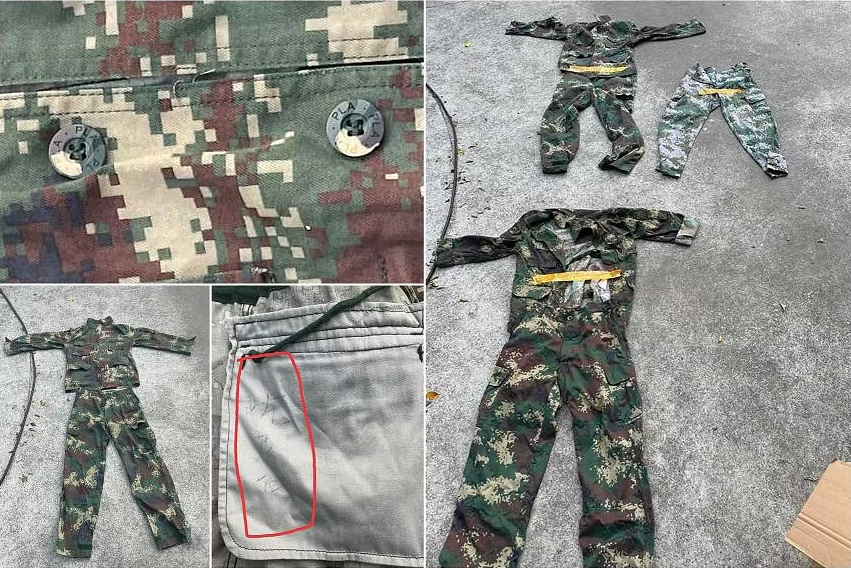 Những bộ quân phục có cúc in chữ &quot;PLA&quot; được tìm thấy trong sòng bạc ở Philippines. (Ảnh: ST)