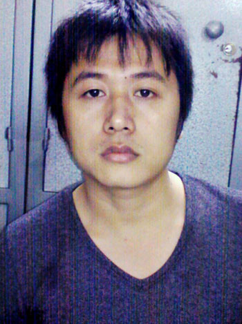 Sát thủ Nguyễn Hữu Tú tại cơ quan điều tra.