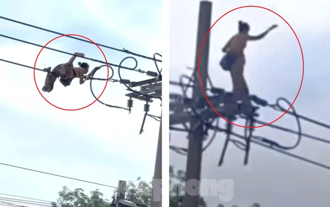 Hình ảnh người phụ nữ bò và đứng trên dây điện trước khi rơi xuống đất