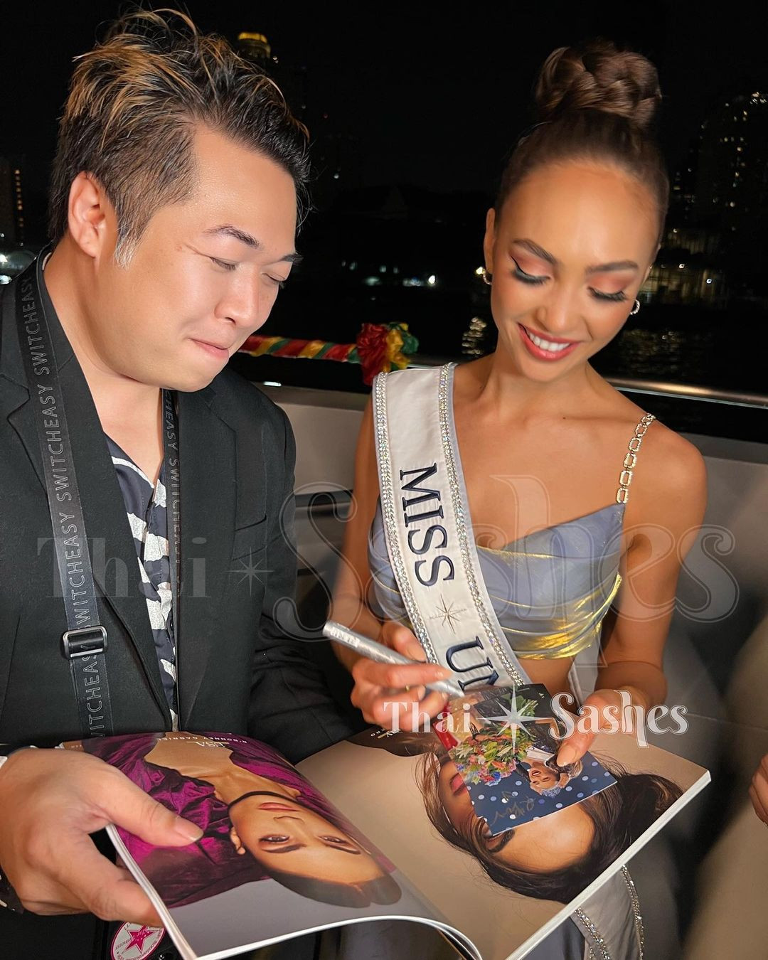 Sự xuất hiện của Hoa hậu Hoàn vũ 2022 R'Bonney Gabriel cùng Á hậu 2 Andreína Martínez, người đẹp top 5 Gabriëla Dos Santos thu hút sự chú ý của khán giả và truyền thông Thái Lan trong những ngày qua. Nhiều fan sắc đẹp có mặt ở buổi tiệc và mang theo những tấm poster để xin chữ ký của các người đẹp.