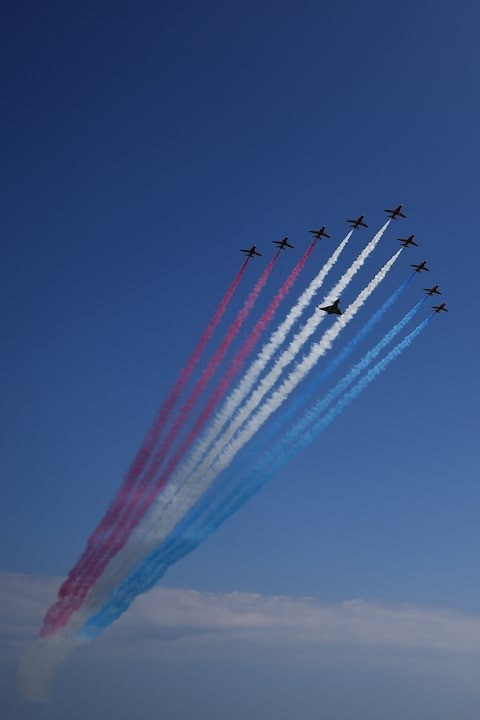 Các máy bay chiến đấu trình diễn tại lễ tưởng niệm. Ảnh: Reuters Các máy bay chiến đấu trình diễn tại lễ tưởng niệm. Ảnh: Reuters