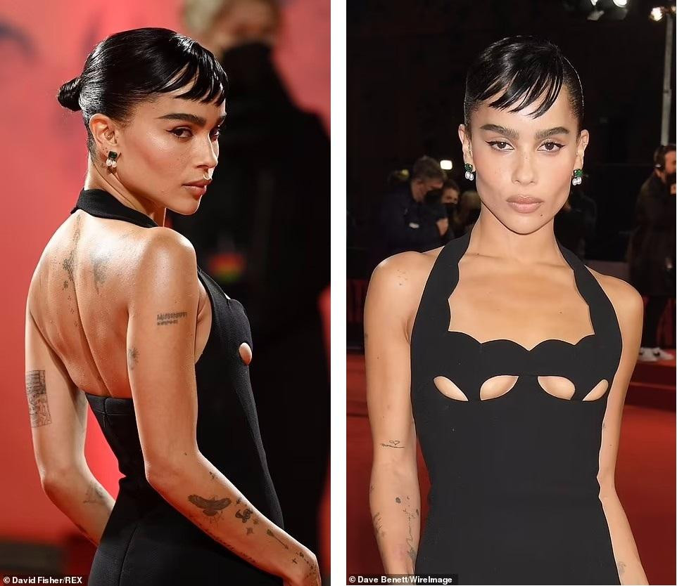 Bộ cánh hở vai, cánh tay và lưng để lộ vô số hình xăm trên cơ thể người đẹp 34 tuổi. Tất cả tạo nên tổng thể vừa đơn giản, thanh lịch, vừa sexy lại không kém phần cá tính.