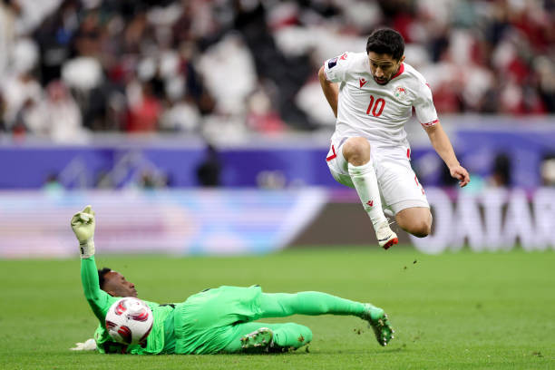 Thắng tối thiểu Tajikistan, Qatar giành vé đầu tiên vượt qua vòng bảng ảnh 14