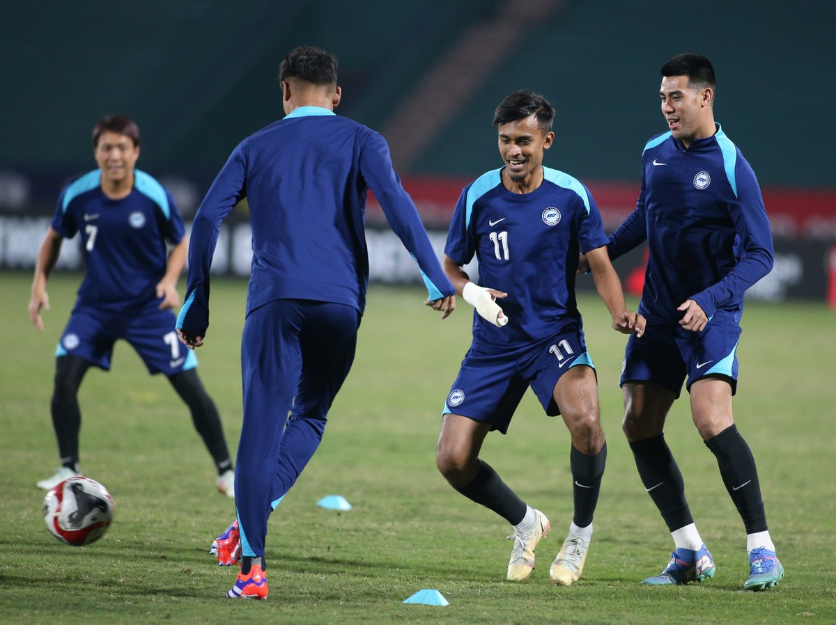 Shakir Hamzah phải băng bó bàn tay phải. Ảnh: Q Thắng Shakir Hamzah phải băng bó bàn tay phải. Ảnh: Q Thắng