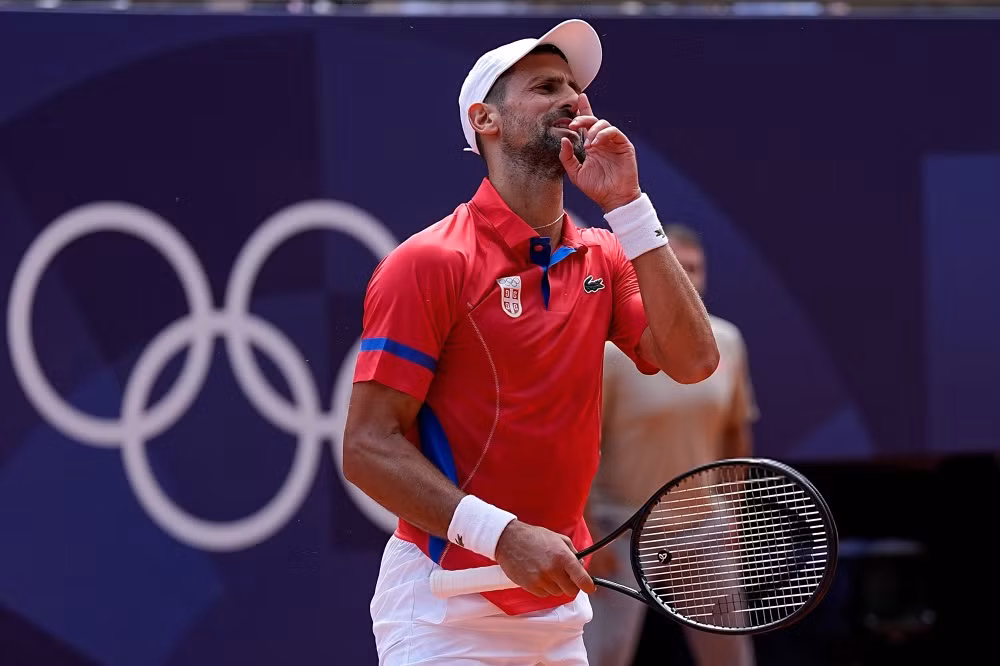 Djokovic ăn mừng tình huống thắng điểm trong trận đấu Djokovic ăn mừng tình huống thắng điểm trong trận đấu