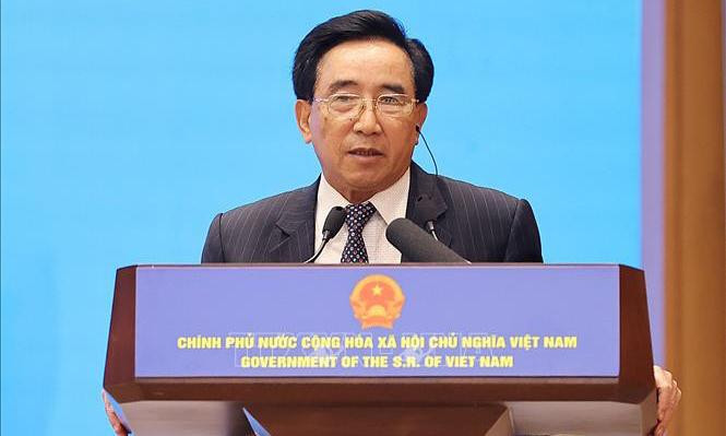 Thủ tướng Lào Phankham Viphavanh phát biểu tại buổi gặp gỡ doanh nghiệp hai nước. Ảnh: Dương Giang/TTXVN.