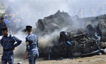 Hiện trường một vụ đánh bom ở Iraq ngày hôm qua (15/9)