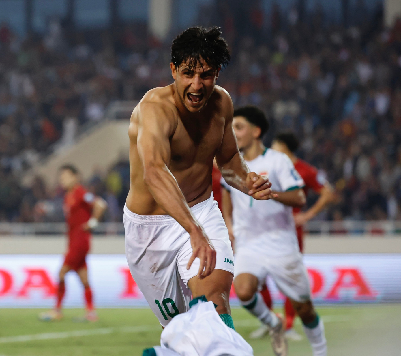 Màn ăn mừng phấn khích của Ali cho thấy Iraq đã khó khăn thế nào. Ảnh: Như Ý