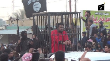 IS nhốt chiến binh người Kurd trong lồng sắt, mang diễu phố ảnh 3 IS nhốt chiến binh người Kurd trong lồng sắt, mang diễu phố ảnh 3