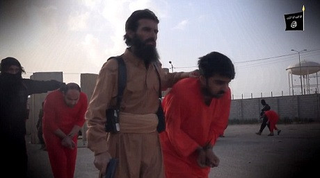 IS nhốt chiến binh người Kurd trong lồng sắt, mang diễu phố ảnh 7 IS nhốt chiến binh người Kurd trong lồng sắt, mang diễu phố ảnh 7