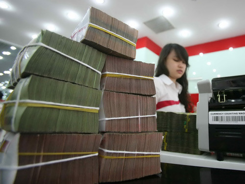 Nhiều ngân hàng thừa tiền nhưng chưa thể cho vay. Ảnh: N.Thắng. Nhiều ngân hàng thừa tiền nhưng chưa thể cho vay. Ảnh: N.Thắng