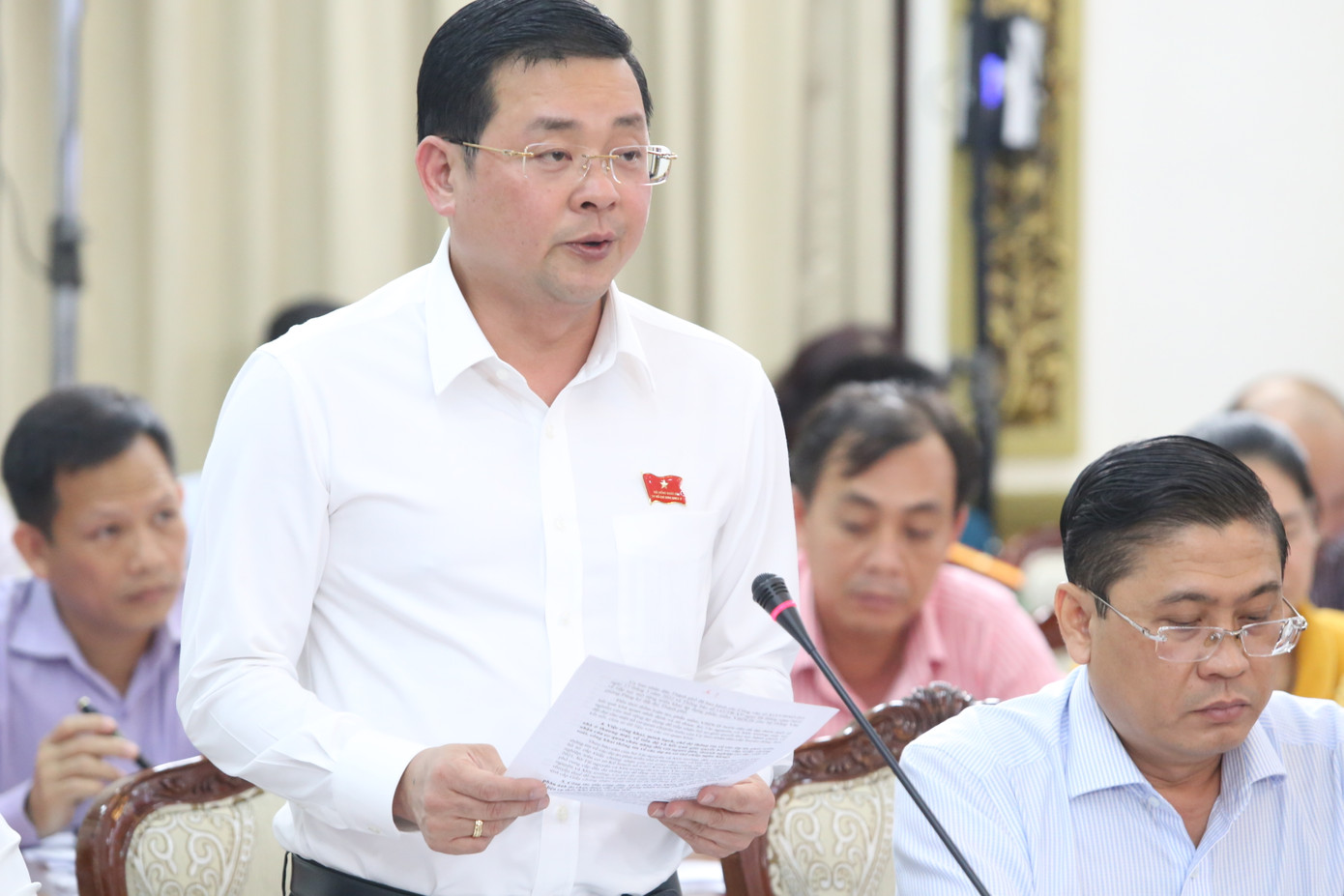 Ông Nguyễn Toàn Thắng trao đổi tại một hội nghị. Ảnh: Ngô Tùng