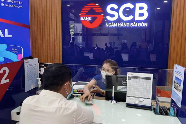 Chính phủ yêu cầu việc xử lý Ngân hàng SCB không để chậm trễ hơn. Ảnh: NLĐ.