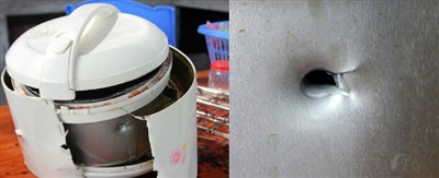 Nồi cơm điện bị đạn bắn hỏng