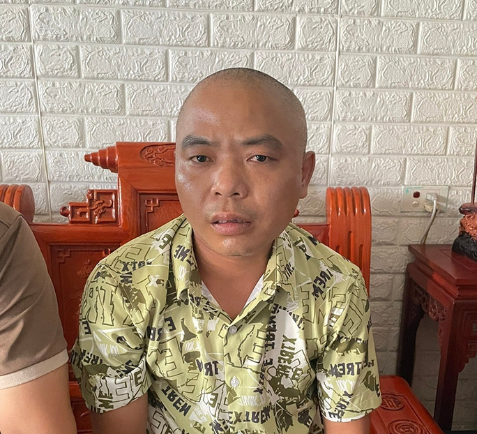 Đối tượng Tình tại cơ quan công an Đối tượng Tình tại cơ quan công an