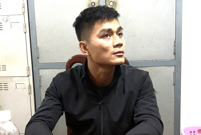 Trần Ngọc Quang tại cơ quan công an