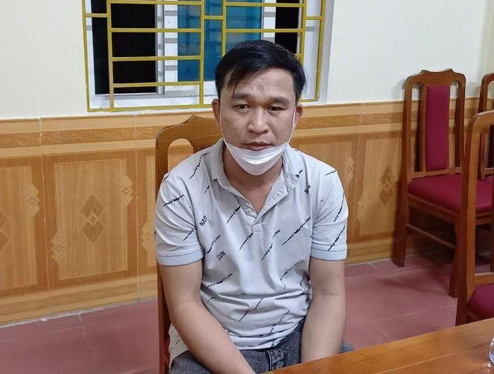 Đối tượng Hồ Quang Đồng tại cơ quan công an