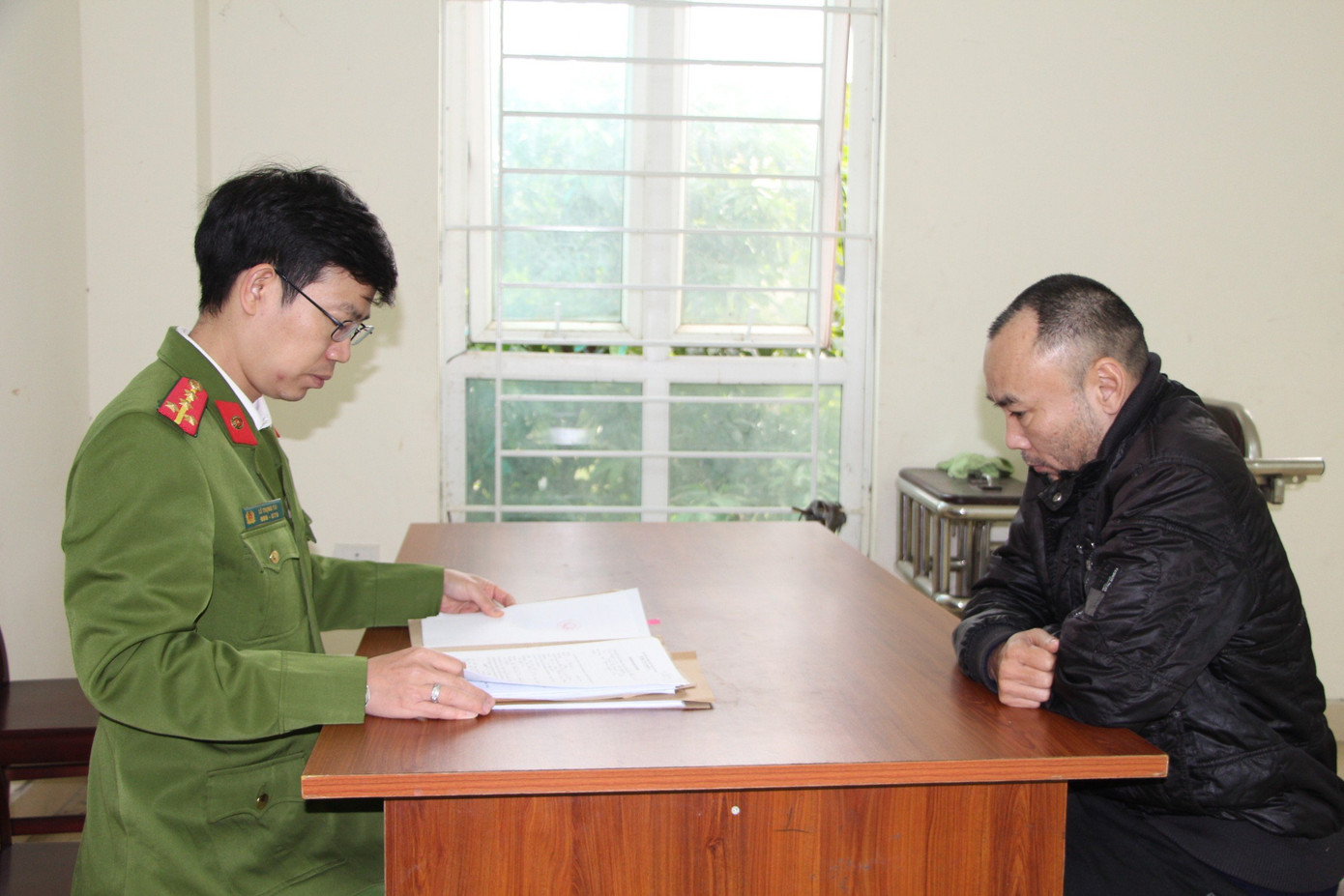 Nguyễn Tiến Dũng tại cơ quan Công an