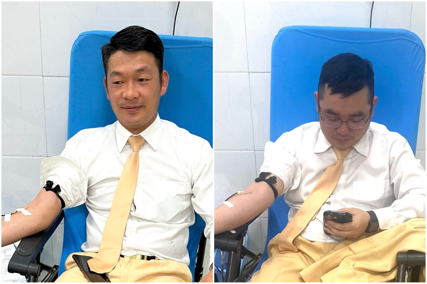 Đại úy Trần Anh Tuấn (trái) và Thượng úy Phạm Huy Tưởng tham gia hiến máu cứu người.