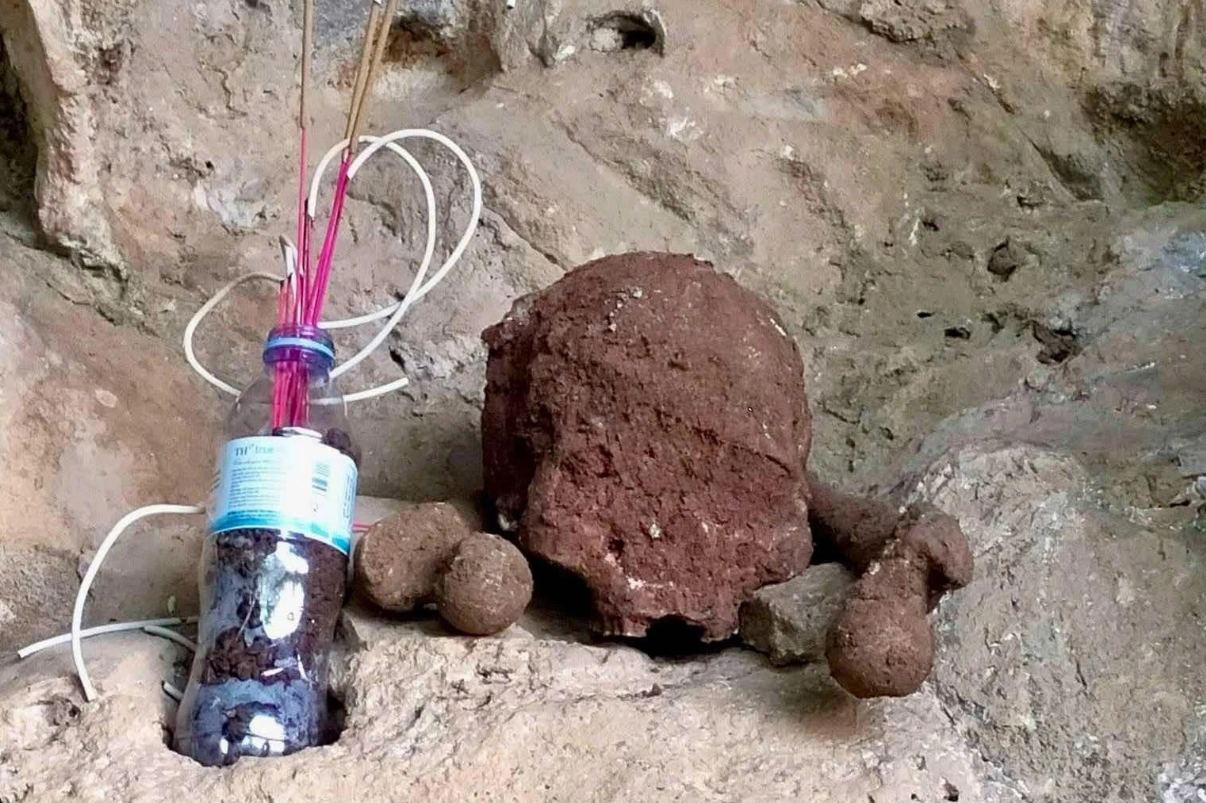 Một phần đầu nghi hộp sọ và xương người được phát hiện ở hang đá Một phần đầu nghi hộp sọ và xương người được phát hiện ở hang đá