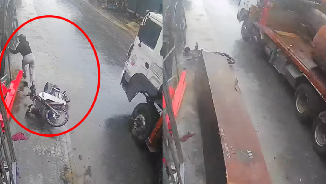 Hình ảnh cô gái bỏ xe máy chạy khi khối gỗ từ ô tô rớt xuống đường.