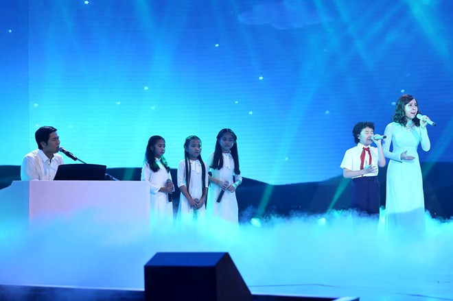 Thiện Nhân đăng quang Giọng hát Việt nhí 2014 ảnh 8