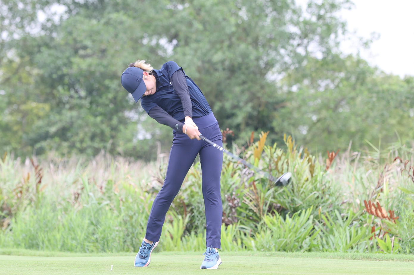 Đương kim vô địch Golf Quốc gia Đoàn Xuân Khuê Minh xuất phát từ hố số 10.