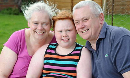 Charlotte và bố mẹ.