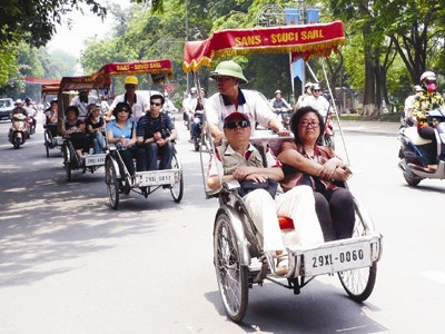 Xích lô du lịch tại Hà Nội Ảnh: T.Đảng