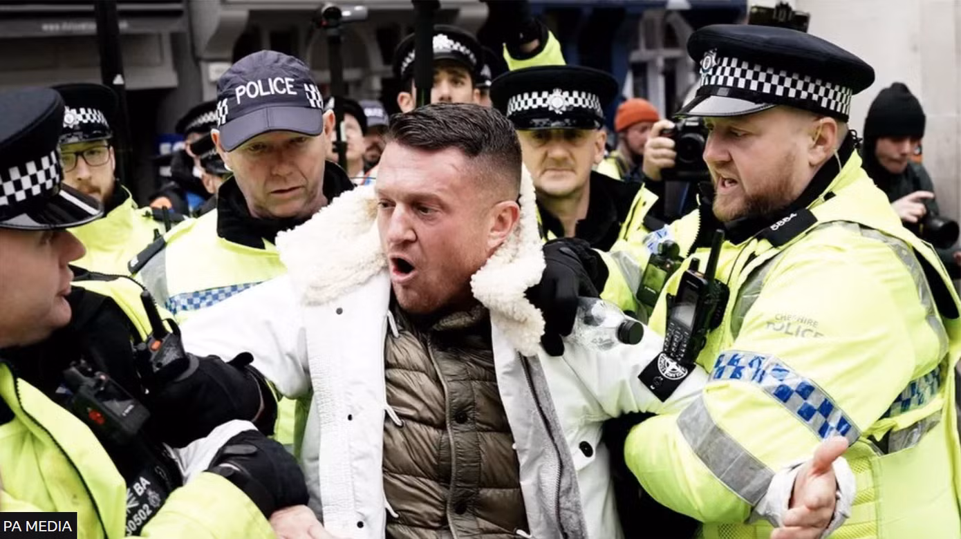 Lực lượng Met bắt giữ Tommy Robinson, nhà hoạt động chính trị cực hữu khét tiếng ở Anh (Ảnh: PA Media).