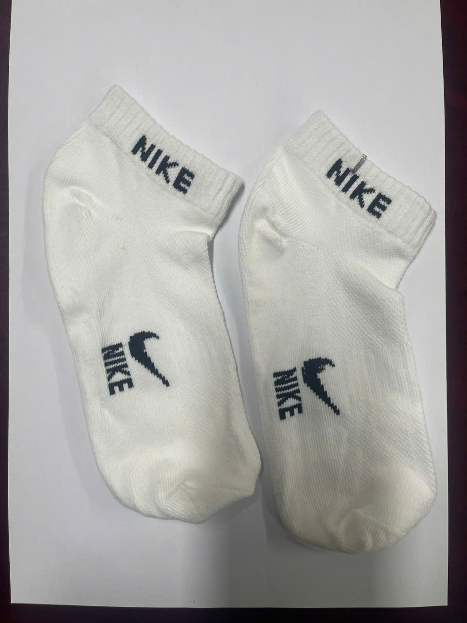 Tất nhái thương hiệu Nike, Adidas, Uniqlo bị thu giữ.