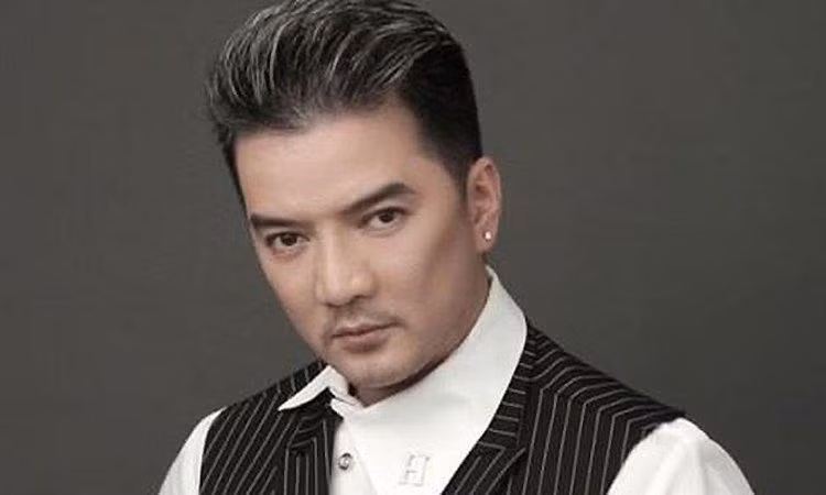 Nam ca sỹ Đàm Vĩnh Hưng.