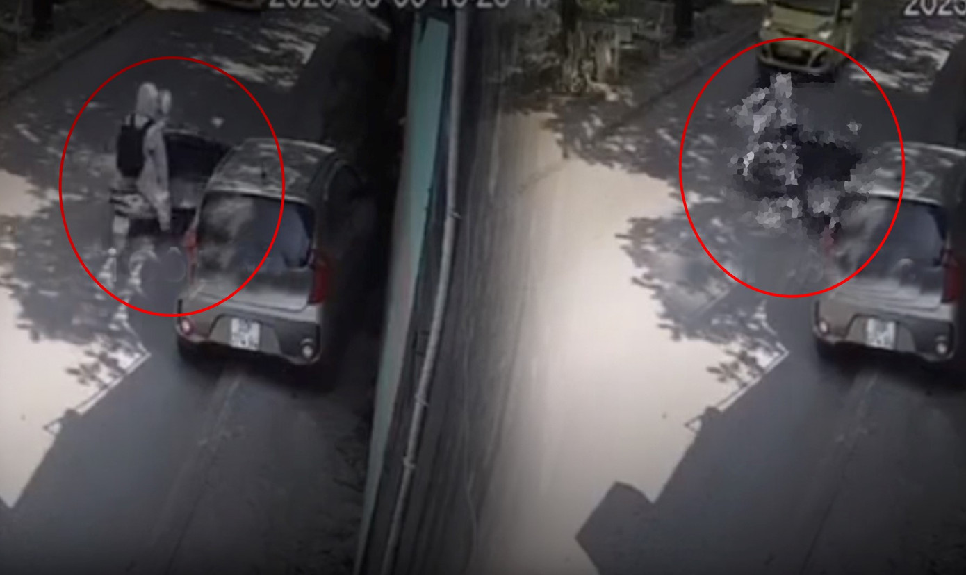 Hình ảnh lái xe taxi bất ngờ mở cửa xe khiến 2 người đi xe máy bị tai nạn (Ảnh cắt từ clip). Hình ảnh lái xe taxi bất ngờ mở cửa xe khiến 2 người đi xe máy bị tai nạn (Ảnh cắt từ clip).