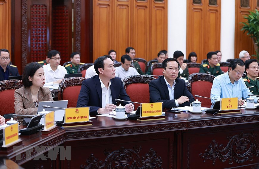 Các thành viên Ban Chỉ đạo tham dự phiên họp. (Ảnh: Dương Giang/TTXVN)