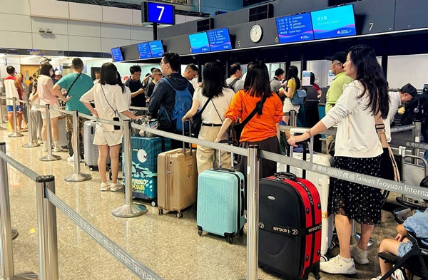 Hành khách tại Sân bay Đào Viên. Ảnh: CNA. Hành khách tại Sân bay Đào Viên. Ảnh: CNA.