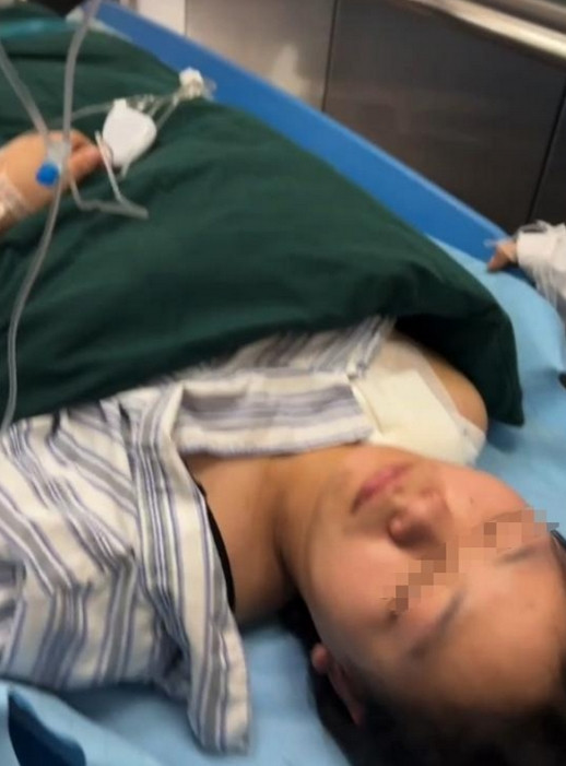 Huang khi ở trong bệnh viện. Ảnh: Jimu News.