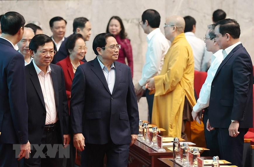 Thủ tướng Phạm Minh Chính đến dự chương trình 'Cả nước chung tay vì người nghèo' năm 2022. (Ảnh: Dương Giang/TTXVN)