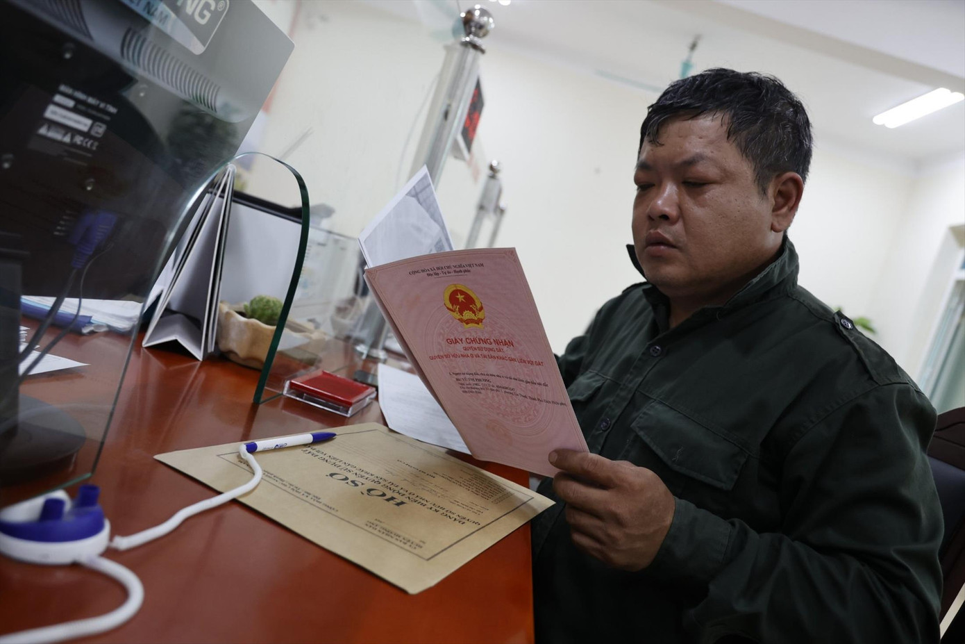 Luật Đất đai (sửa đổi) hướng tới đơn giản hóa thủ tục hành chính. Ảnh: Như Ý