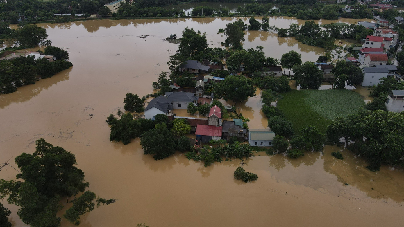 Nhiều khu vực dân cư ở huyện Chương Mỹ, Quốc Oai (Hà Nội) bị ngập lụt. Ảnh: Hữu Thắng.