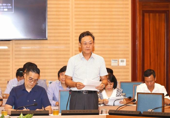 Giám đốc Sở Kế hoạch và Đầu tư thành phố Hà Nội Lê Anh Quân báo cáo tại cuộc họp. Ảnh: PV.