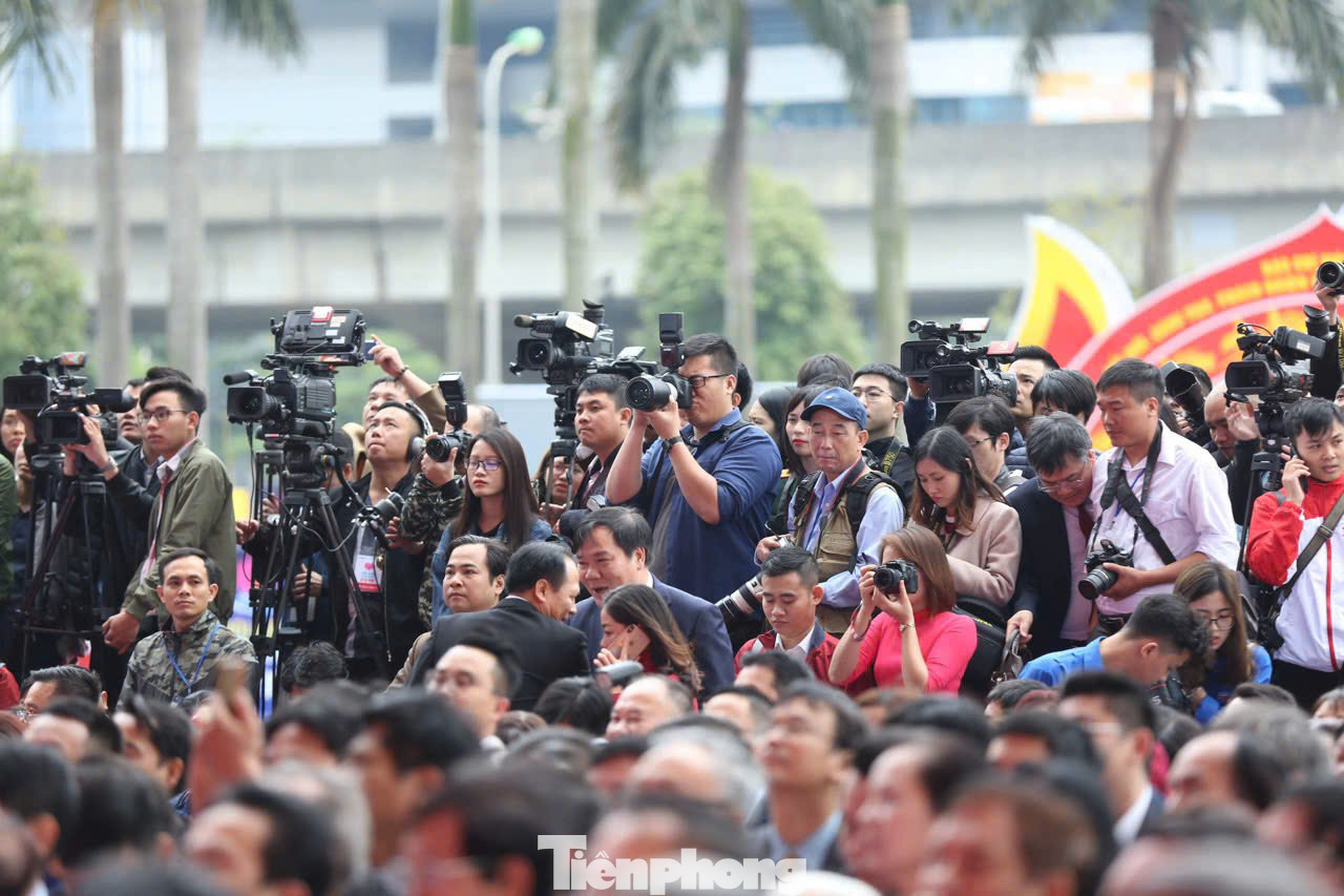 Phóng viên, nhà báo tác nghiệp tại một sự kiện ở Hà Nội. Ảnh: Như Ý.