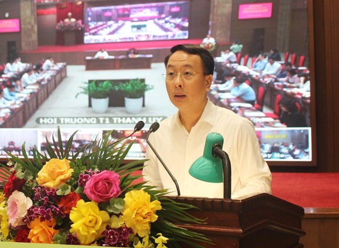 Giám đốc Sở Nội vụ Hà Nội Trần Đình Cảnh báo cáo tại hội nghị. Ảnh: PV. Giám đốc Sở Nội vụ Hà Nội Trần Đình Cảnh báo cáo tại hội nghị. Ảnh: PV.